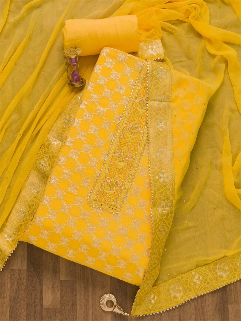 

Koskii Yellow Embroidered Unstitched Dress Material