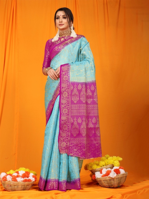 

Anaita Turquoise Blue & Magenta Ethnic Motifs Zari Pure Silk Banarasi Saree
