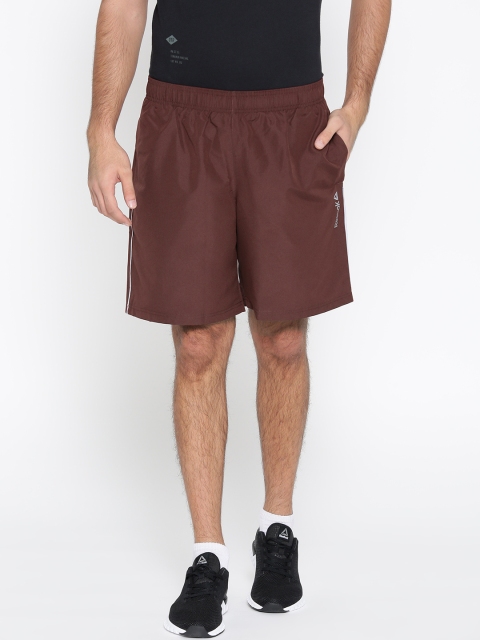 

Reebok Men Burgundy Core Woven Solid Sports Shorts