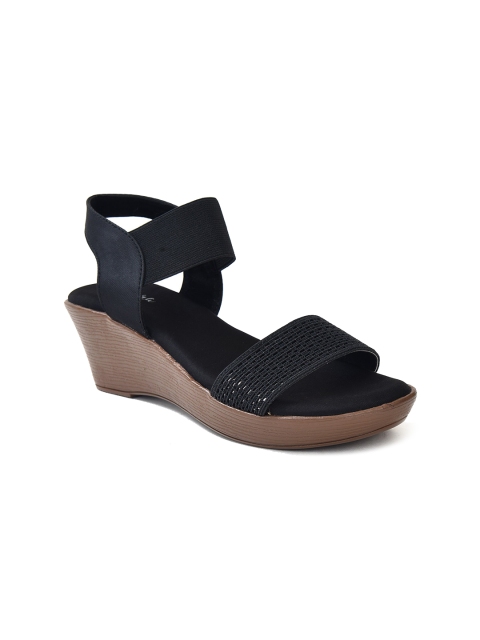 

Ajanta Black Wedge Sandals with Laser Cuts