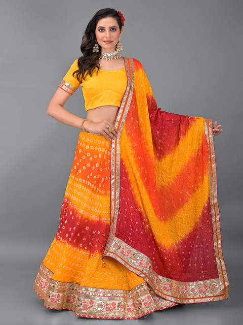 

Apratim Women Mustard & White Semi-Stitched Lehenga & Unstitched Blouse With Dupatta