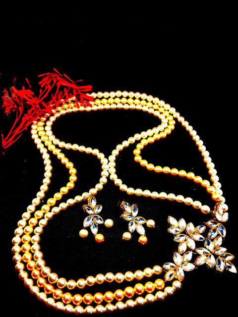 

Kshitij Jewels Gold-Plated White Stone-Studded & Pearl Beaded Jewellery Set