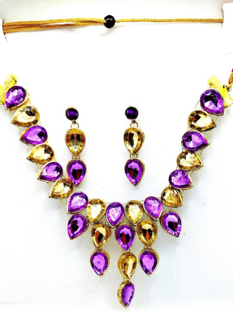 

Kshitij Jewels Gold-Plated Purple Artificial Stones and Beads Jewellery Set