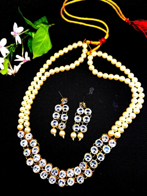 

Kshitij Jewels Gold Plated White Jewellery Set