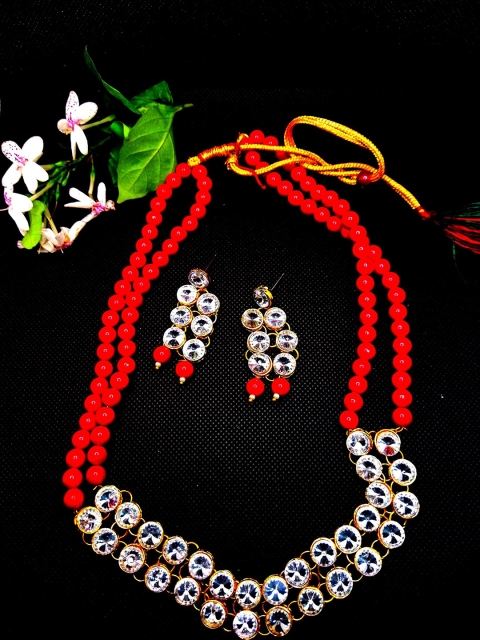 

Kshitij Jewels Gold-Plated Red & White Crystal Studded & Beaded Jewellery Set