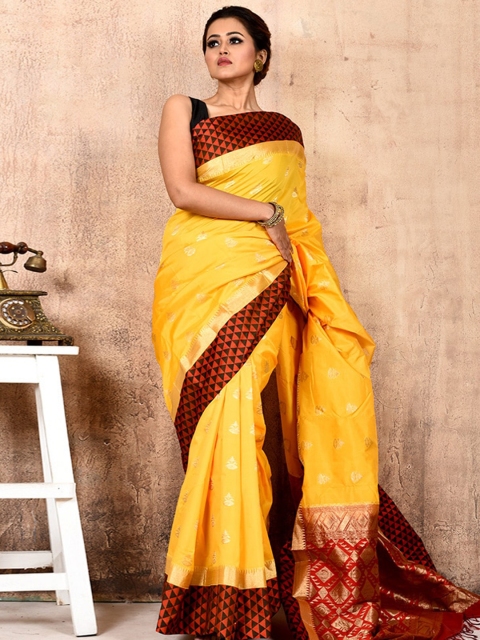 

AllSilks Yellow & Maroon Ethnic Motifs Zari Silk Blend Saree