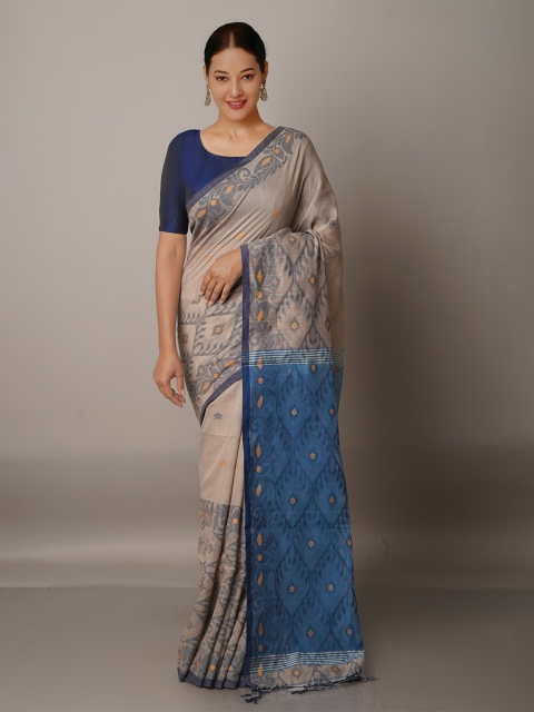 

Unnati Silks Grey & Blue Woven Design Zari Silk Cotton Jamdani Saree