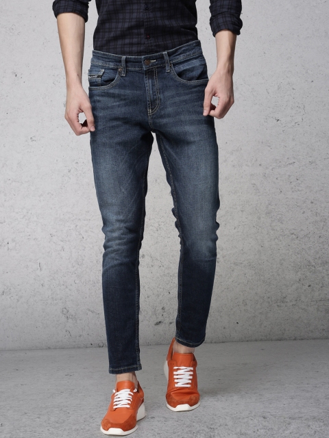 

Ecko Unltd Men Blue Slim Tapered Fit Mid-Rise Clean Look Stretchable Jeans