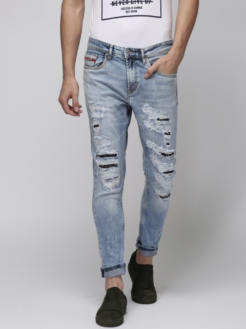 

Ecko Unltd Men Blue Tapered Fit Mid-Rise Highly Distressed Jeans