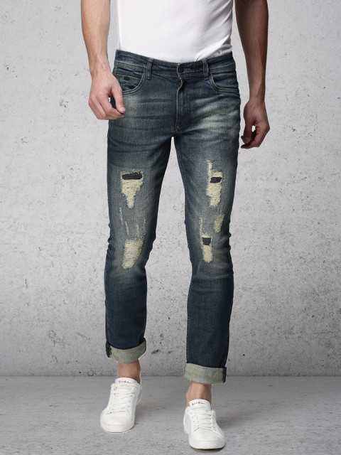 

Ecko Unltd Men Blue Slim Fit Mid-Rise Highly Distressed Stretchable Jeans