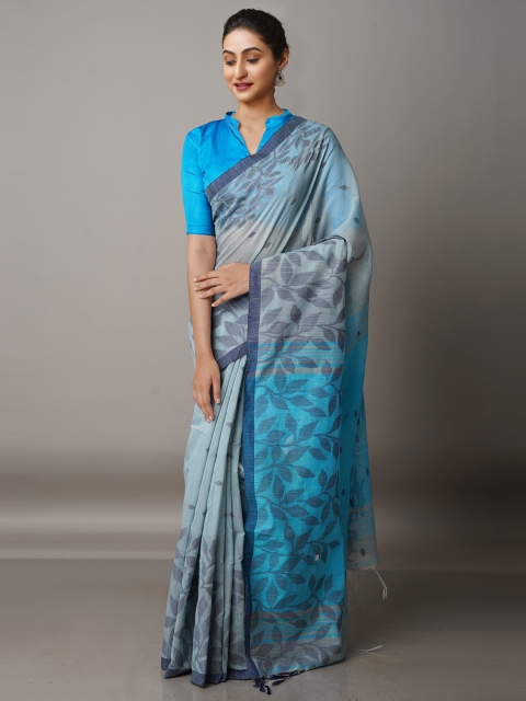 

Unnati Silks Grey & Blue Floral Silk Cotton Jamdani Saree