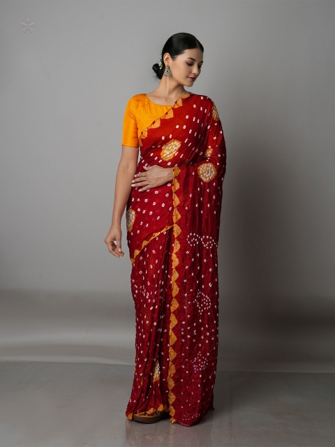 

Unnati Silks Maroon & Orange Bandhani Silk Blend Bandhani Saree