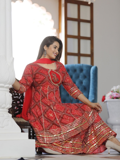 

SINGNI Women Red Ethnic Motifs Kurta with Sharara & Dupatta