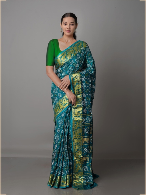 

Unnati Silks Green & White Bandhani Zari Silk Blend Bandhani Saree