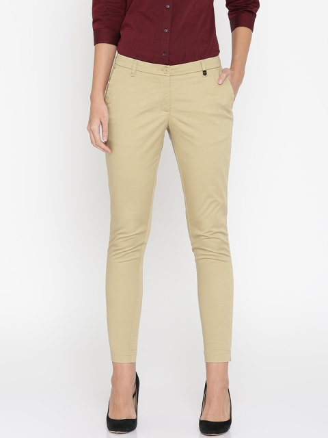 

Park Avenue Woman Beige Tapered Fit Solid Formal Trousers