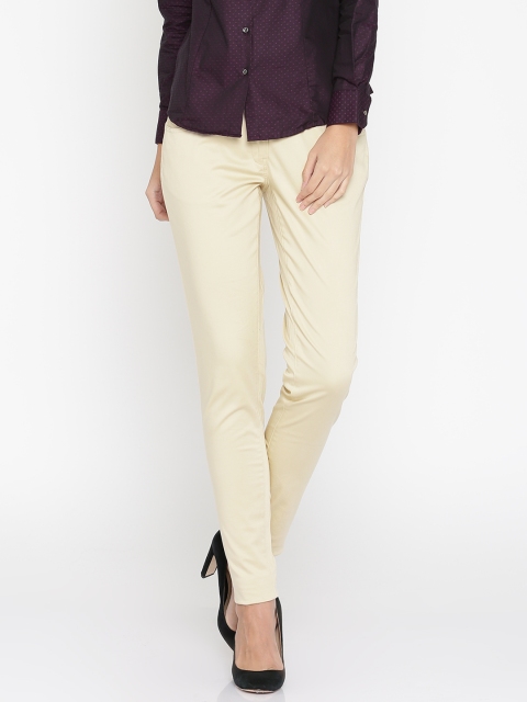 

Park Avenue Woman Beige Tapered Fit Solid Formal Trousers