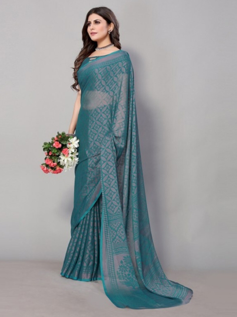 

Yashika Teal Floral Printed Saree with Blouse Piece