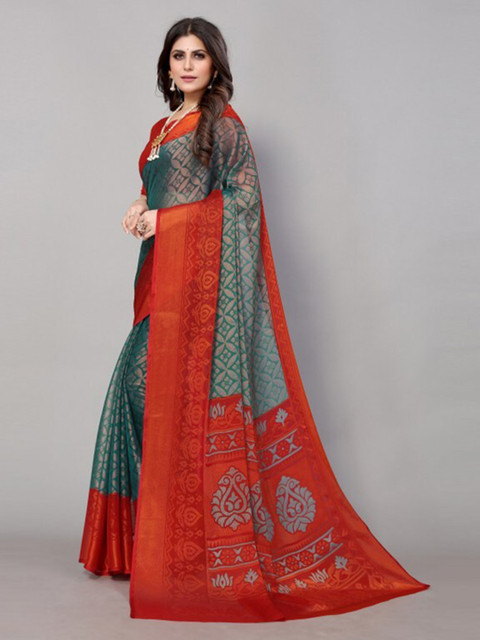 

Yashika Red & Teal Green Floral Printed Saree with Blouse Piece