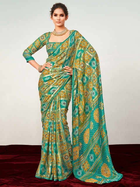 

Mitera Turquoise Blue & Yellow Ethnic Motifs Pure Georgette Patola Saree