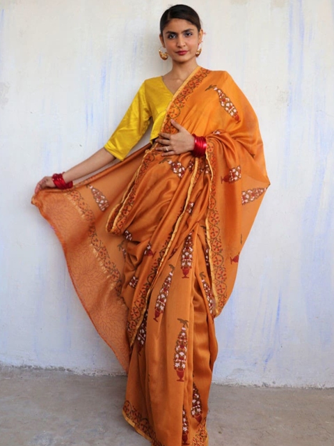 

Chidiyaa Women Orange & Brown Floral Zari Pure Silk Chanderi Saree