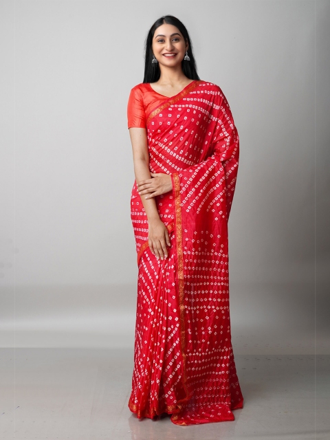 

Unnati Silks Red & White Bandhani Zari Silk Blend Bandhani Saree