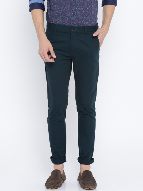 

Arrow Sport Men Navy Slim Fit Solid Chinos, Navy blue