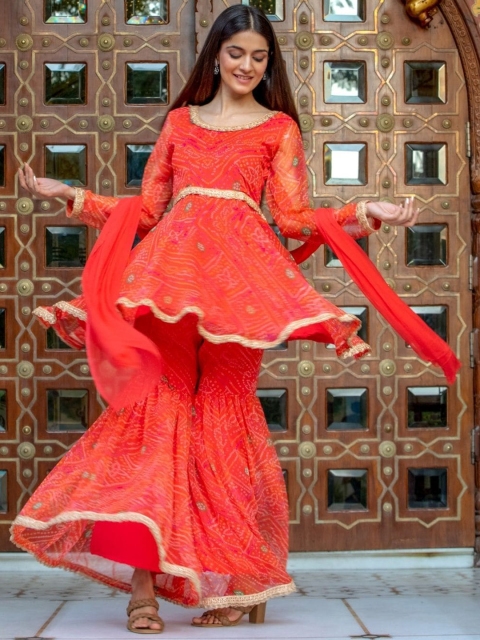 

HOUSE OF JAMOTI Women Orange Bandhani Printed Kurta with Sharara & With Dupatta