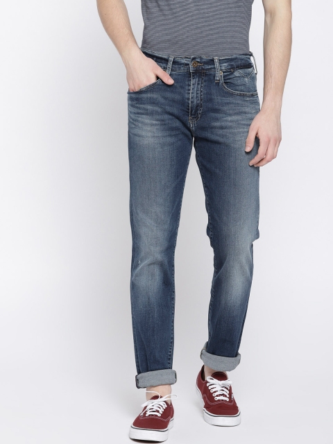 

Tommy Hilfiger Men Blue Relaxed Fit Mid-Rise Clean Look Jeans