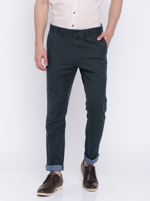 

Tommy Hilfiger Men Blue Straight Fit Self Design Chinos