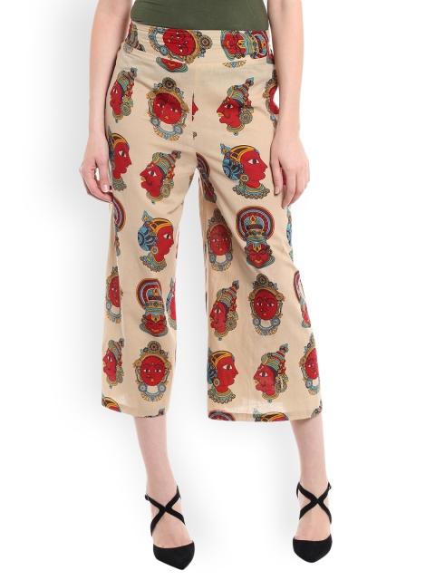 

Desi Weavess Women Beige Flared Printed Palazzos