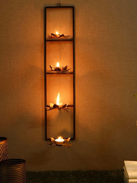 

Unravel India Gold-Toned & Black Wall Candle Holders