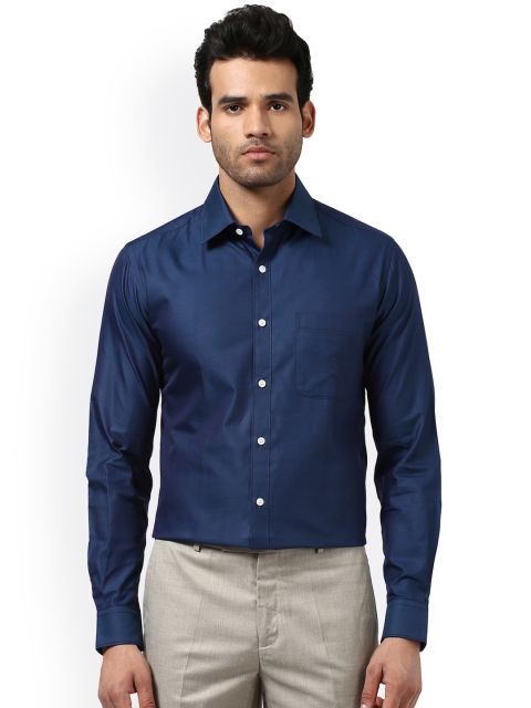 

Raymond Men Blue Smart Slim Fit Solid Formal Shirt