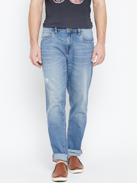 

Arrow Blue Jean Co. Men Blue Relaxed Mid-Rise Low Distress Stretchable Jeans