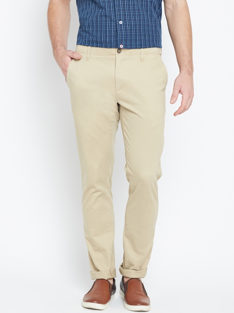 

Arrow Sport Men Beige Chrysler Tapered Fit Solid Regular Trousers