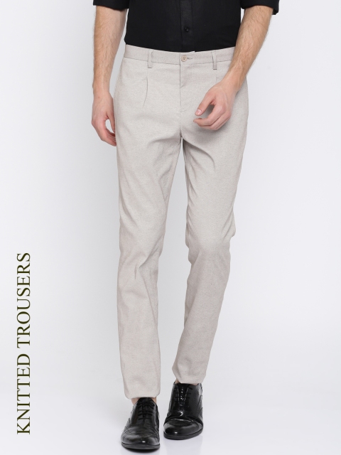 

INVICTUS Men Beige Slim Fit Self Design Regular Trousers