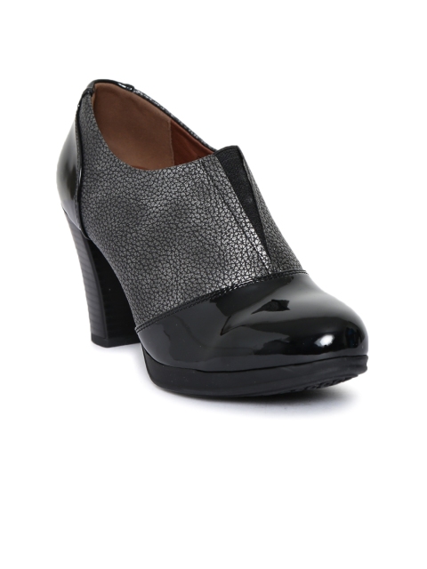 

Catwalk Women Black Solid Heeled Boots