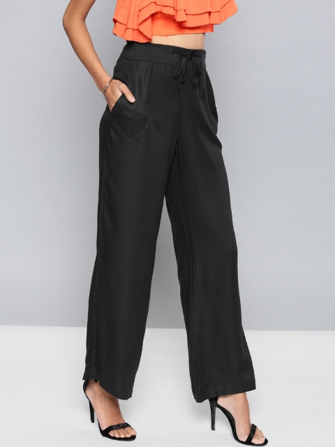 

NUSH Women Black Relaxed Loose Fit Solid Bootcut Trousers