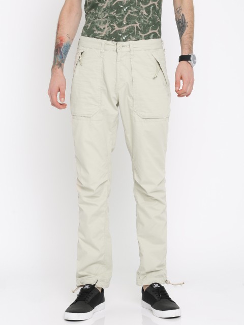 

RIG Men Beige Regular Fit Solid Trousers