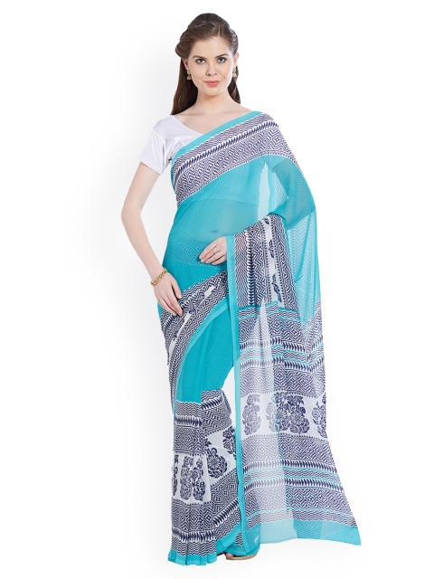 

Nanda Silk Mills Turquoise Blue Printed Pure Georgette Saree