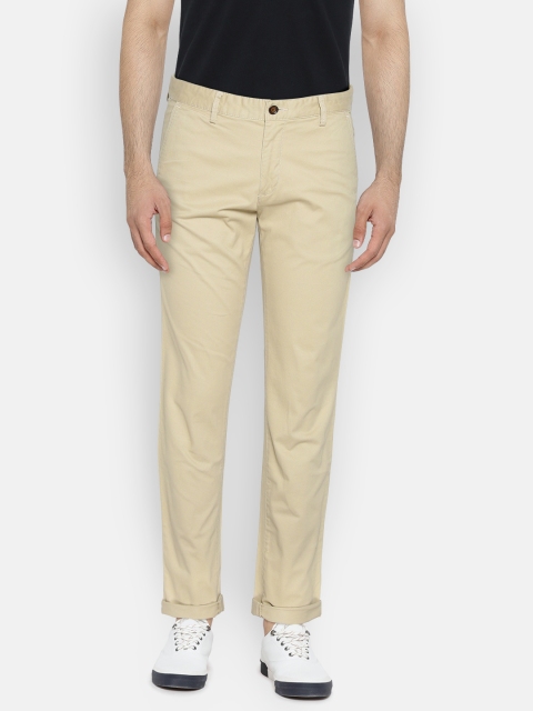 

Arrow Sport Men Beige Chrysler Tapered Fit Solid CasualTrousers