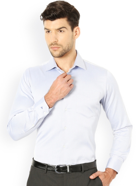 

Van Heusen Men Blue Solid Formal Shirt