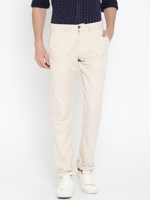 

Arrow Sport Men Beige Slim Fit Solid Regular Trousers