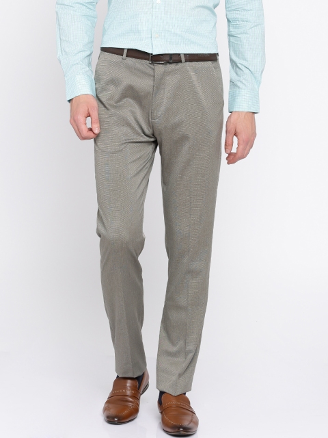 

Arrow New York Men Brown Tapered Fit Solid Formal Trousers