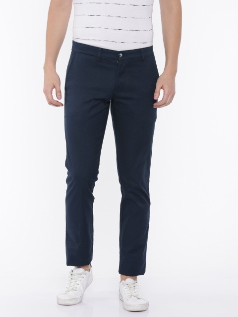 

Parx Men Navy Blue Tapered Fit Self Design Regular Trousers
