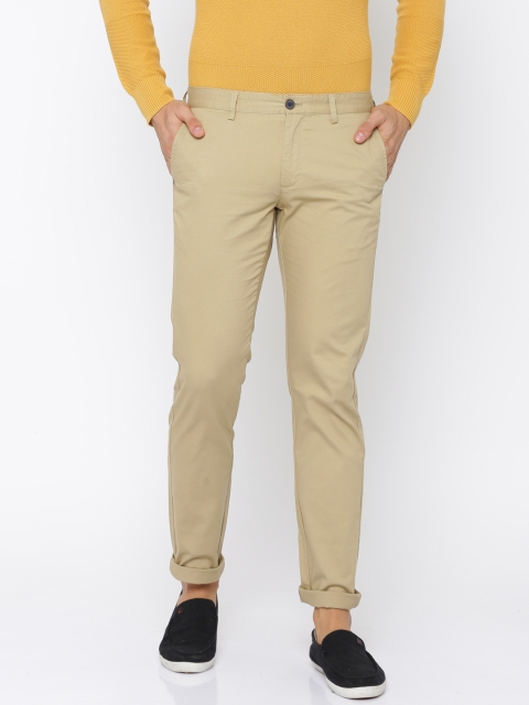 

Indian Terrain Men Khaki Brooklyn Slim Fit Self Design Regular Trousers