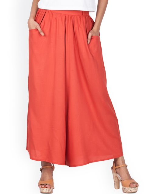 

Zink London Women Orange Solid Flared Palazzos