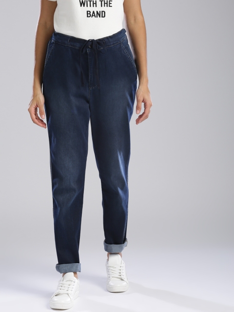 

Levis Women Blue Tapered Fit Mid-Rise Clean Look Stretchable Jeans