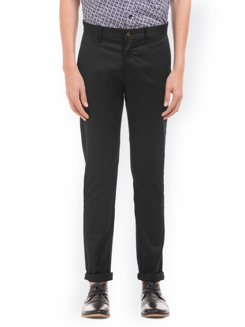 

Arrow Sport Men Black Solid Regular Trousers