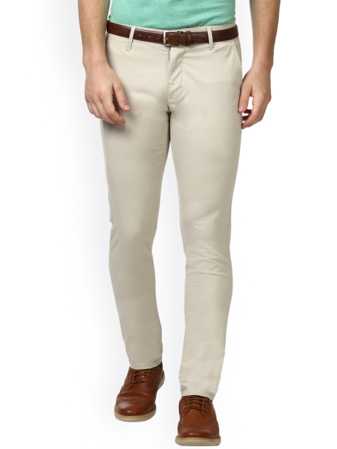 

Parx Men Beige Tapered Fit Solid Formal Trousers