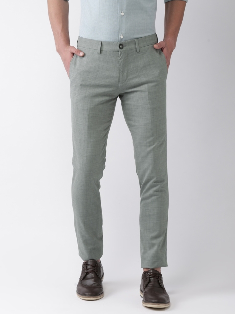 

Tommy Hilfiger Men Grey Extra Slim Fit Solid Formal Trousers